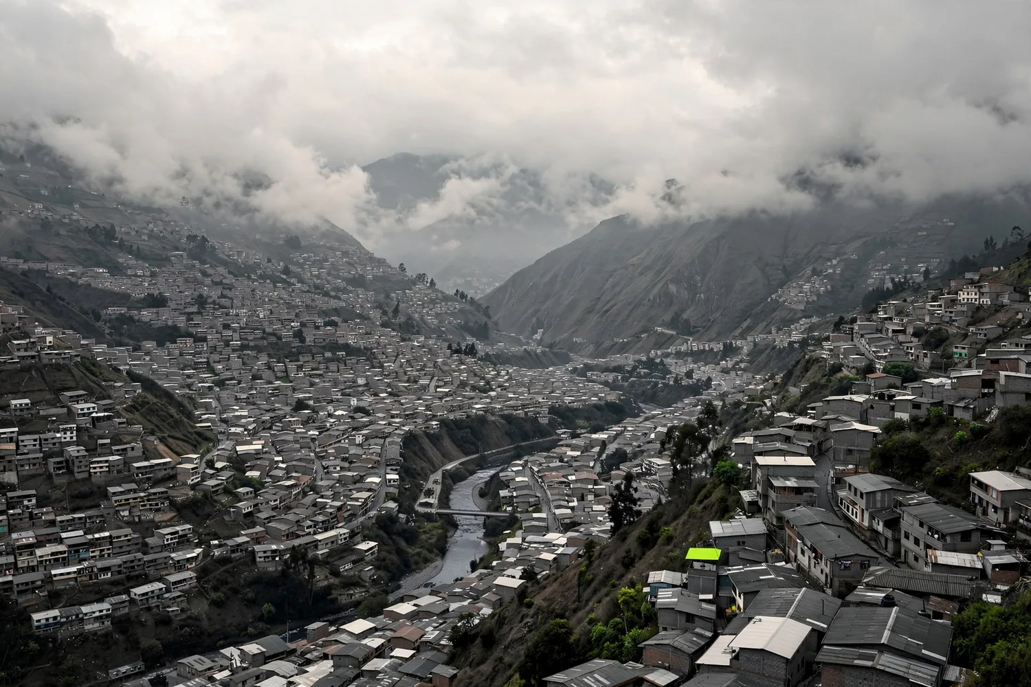 A valley city under low clouds